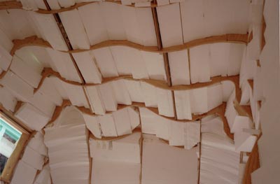 Process image interior ceiling of trailer made of stryfoam blocks.